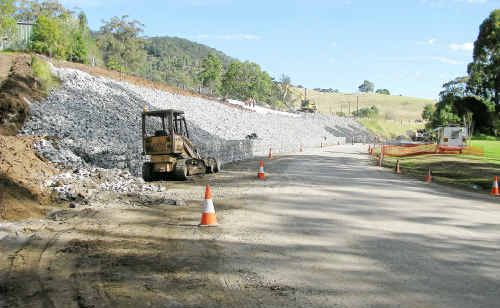 Nearly 3000 tonnes of terraced rock wall was used to stabilise Spring Creek Road below Sue and Bruce Hoffman’s property. Nearly 3000 tonnes of terraced rock wall was used to stabilise Spring Creek Road below Sue and Bruce Hoffman’s property.